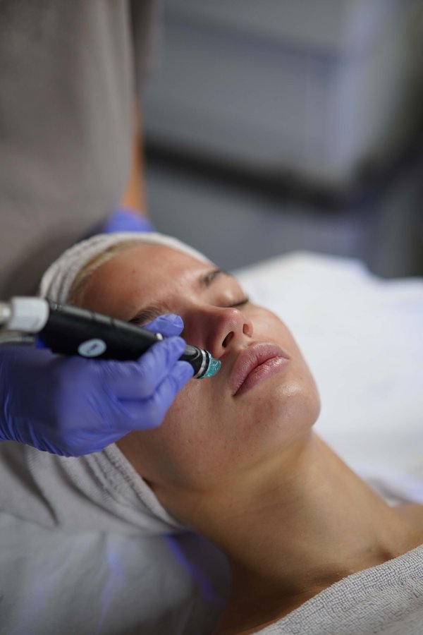 Client with glowing, hydrated skin after HydraFacial treatment